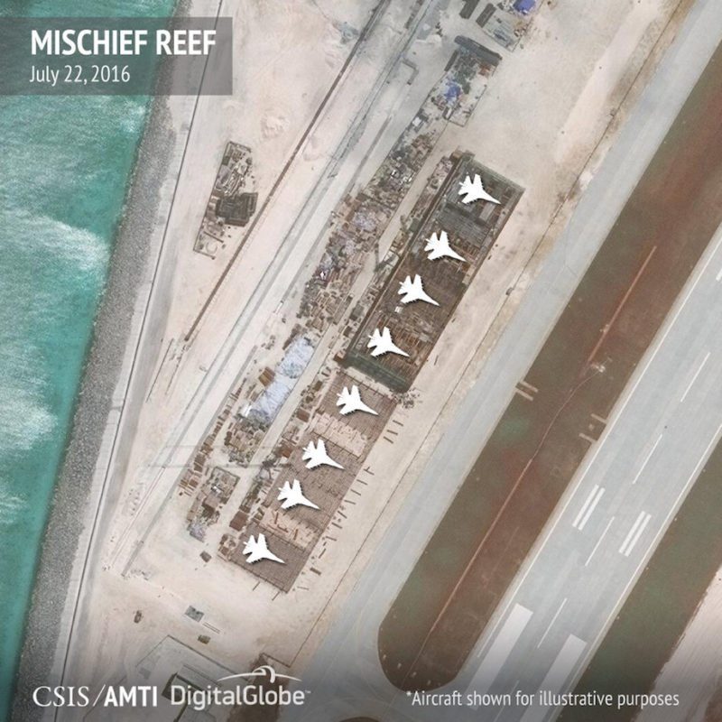 Aircraft hangars that, according to the Center for Strategic and International Studies (CSIS), have room for any fighter jet in the Chinese air force are seen on Mischief Reef in the Spratly islands, in the disputed South China Sea in this July 22, 2016 satellite image released by the Asian Maritime Transparency Initiative at CSIS to Reuters on August 9, 2016. Aircrafts added at source for illustrative purposes. CSIS Asia Maritime Transparency Initiative/DigitalGlobe/Handout via REUTERS ATTENTION EDITORS - THIS IMAGE WAS PROVIDED BY A THIRD PARTY. REUTERS IS UNABLE TO INDEPENDENTLY VERIFY THE AUTHENTICITY, CONTENT, LOCATION OR DATE OF THIS IMAGE. FOR EDITORIAL USE ONLY. NOT FOR SALE FOR MARKETING OR ADVERTISING CAMPAIGNS. NO COMMERCIAL OR BOOK SALES. MANDATORY CREDIT. NO RESALES. NO ARCHIVES. TPX IMAGES OF THE DAY