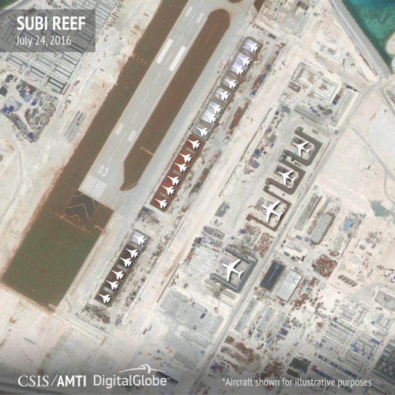 Aircraft hangars that, according to the Center for Strategic and International Studies (CSIS), have room for any fighter jet in the Chinese air force are seen on Subi Reef in the Spratly islands, in the disputed South China Sea in this July 24, 2016 satellite image released by the Asian Maritime Transparency Initiative at CSIS to Reuters on August 9, 2016. Aircrafts added at source for illustrative purposes. CSIS Asia Maritime Transparency Initiative/DigitalGlobe/Handout via REUTERS ATTENTION EDITORS - THIS IMAGE WAS PROVIDED BY A THIRD PARTY. REUTERS IS UNABLE TO INDEPENDENTLY VERIFY THE AUTHENTICITY, CONTENT, LOCATION OR DATE OF THIS IMAGE. FOR EDITORIAL USE ONLY. NOT FOR SALE FOR MARKETING OR ADVERTISING CAMPAIGNS. NO COMMERCIAL OR BOOK SALES. MANDATORY CREDIT. NO RESALES. NO ARCHIVES.