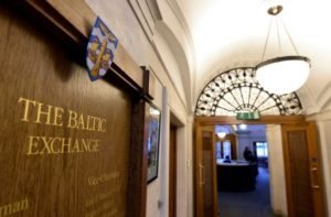 A wooden plaque is seen on a wall at The Baltic Exchange in the City of London
