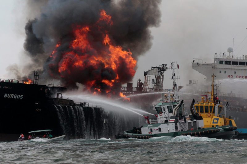 Firefighters extinguish a fire on an oil tanker of Mexican state oil company Pemex named "Burgos" off the coast of Boca del Rio in Veracruz state, Mexico September 24, 2016. REUTERS/Victor Yanez 
