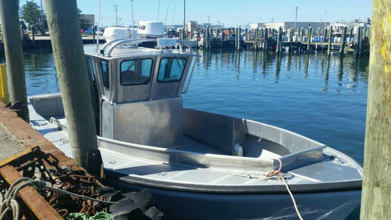 The Coast Guard is searching for this 32-foot aluminum boat, Monday, Sept. 19, 2016 near Block Island, Rhode Island. The boat and with two passengers aboard were reported as overdue after not returning from a fishing trip. U.S Coast Guard courtesy photo.