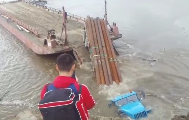 WATCH: Truck FAILS at Backing Onto Barge