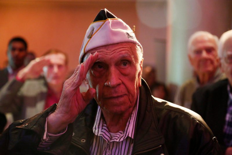 Tom Person, a 95-year-old Pearl Harbor survivor, salutes during the national anthem at an event honoring 30 surviving World War II veterans who will travel to Hawaii to attend ceremonies for the 75th anniversary of the attack on Pearl Harbor, in Beverly Hills, California, U.S., December 2, 2016. Picture taken December 2, 2016. REUTERS/Ted Soqui