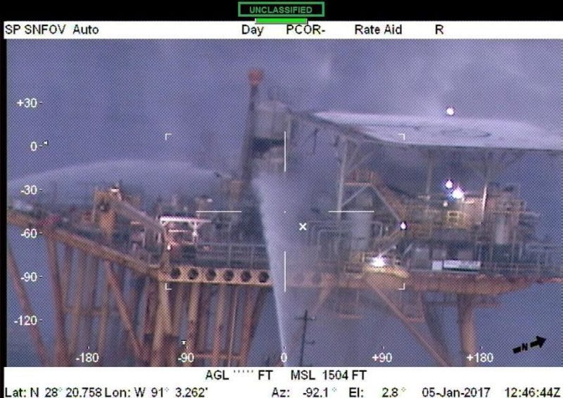 Four offshore supply vessels extinguish a fire on an oil production platform fire near Grand Isle, Louisiana, January 5, 2017. U.S. Coast Guard Photo