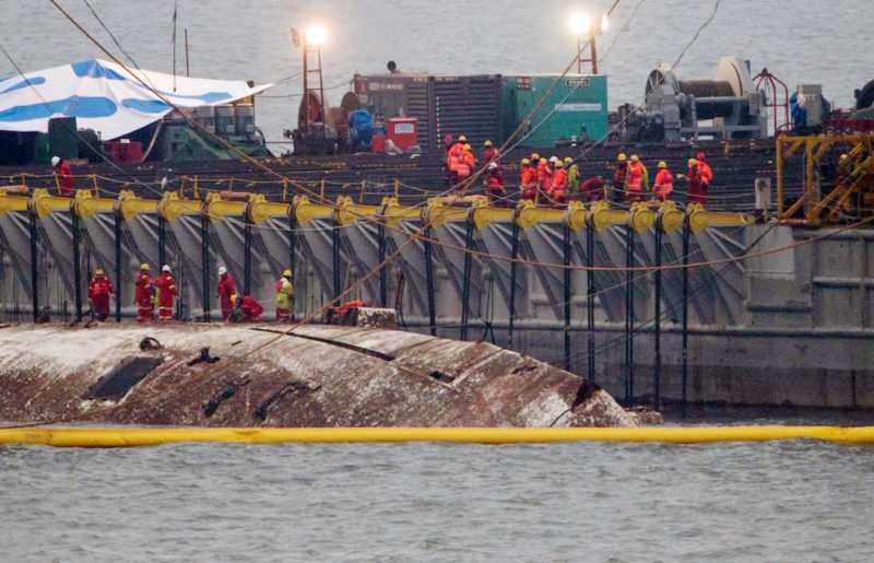 The sunken ferry Sewol is raised during its salvage operations at the sea off Jindo, South Korea, March 23, 2017. News1 via REUTERS 