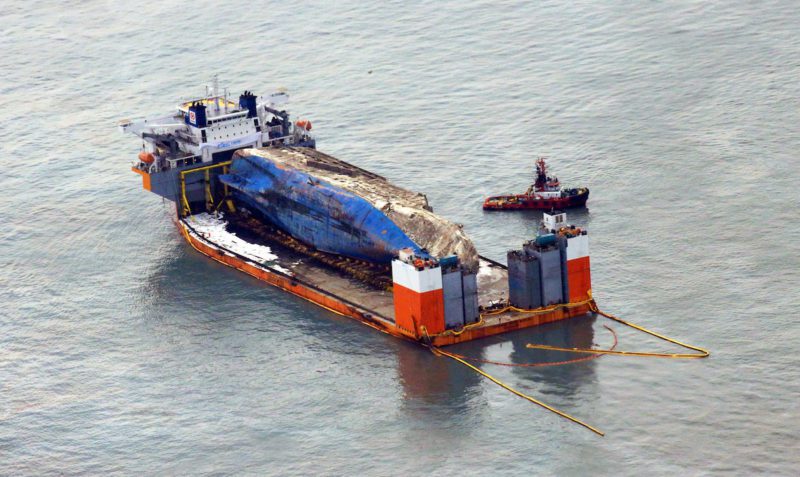 The sunken ferry Sewol sits on a semi-submersible ship during its salvage operations at the sea off Jindo, South Korea, March 26, 2017. Yonhap via REUTERS