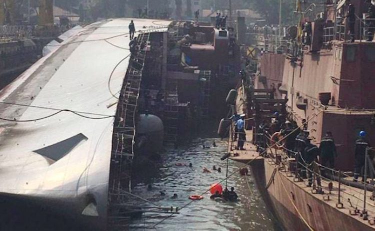 Capsized Indian Navy Frigate Righted in Mumbai Dock