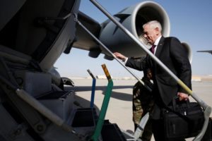 Mattis boards a U.S. Air Force C-17 for a day trip to a U.S. military base in Djibouti from Doha