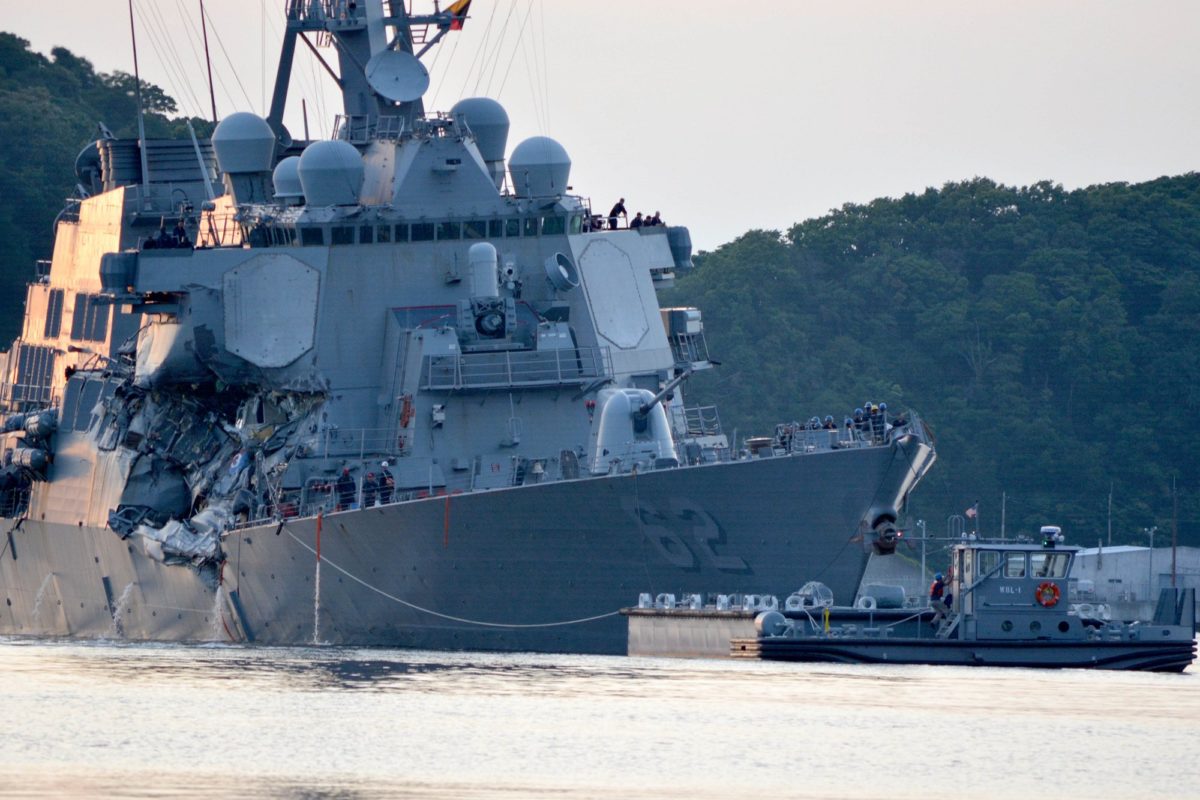 USS Fitzgerald with Tugboat Assistance