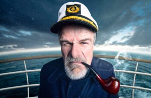angry-ship-captain with captain's hat