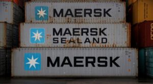 Empty Maersk shipping containers are seen stacked at Peel Ports container terminal in Liverpool