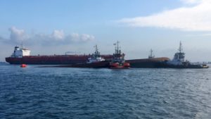 singapore tanker collides with dredger