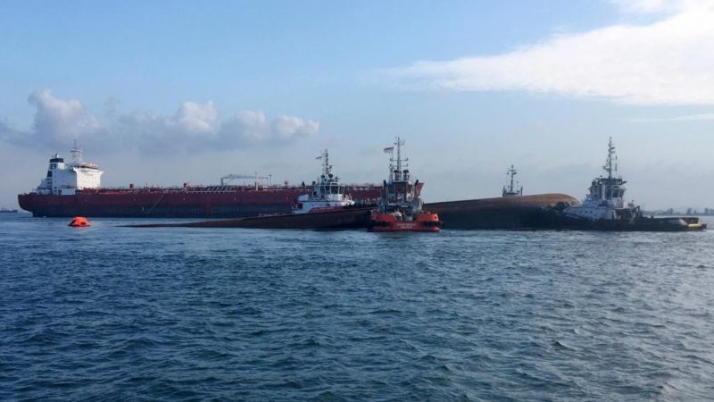 singapore tanker collides with dredger