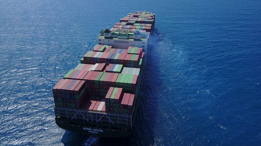 An aerial of a containership showing emissions