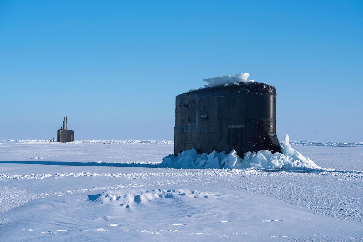 navy subs emerge in arctic circle