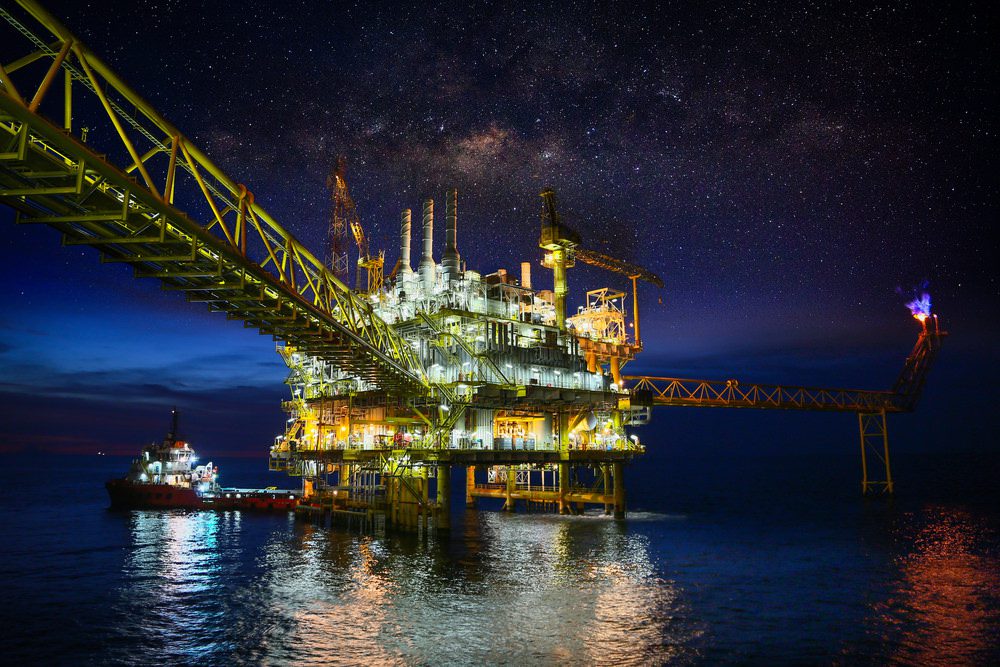 Offshore Oil Rig At Night
