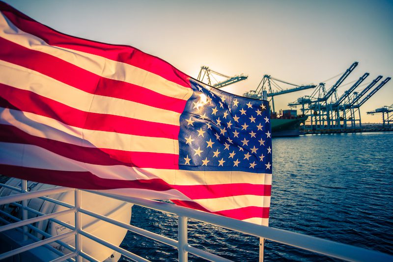American Flag ShipAn American Flag flying from a US Merchant Ship. Stock Photo Logra/ Shutterstock