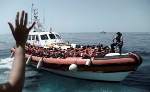 Migrants are seen after being rescued by MV Aquarius in the central Mediterranean Sea