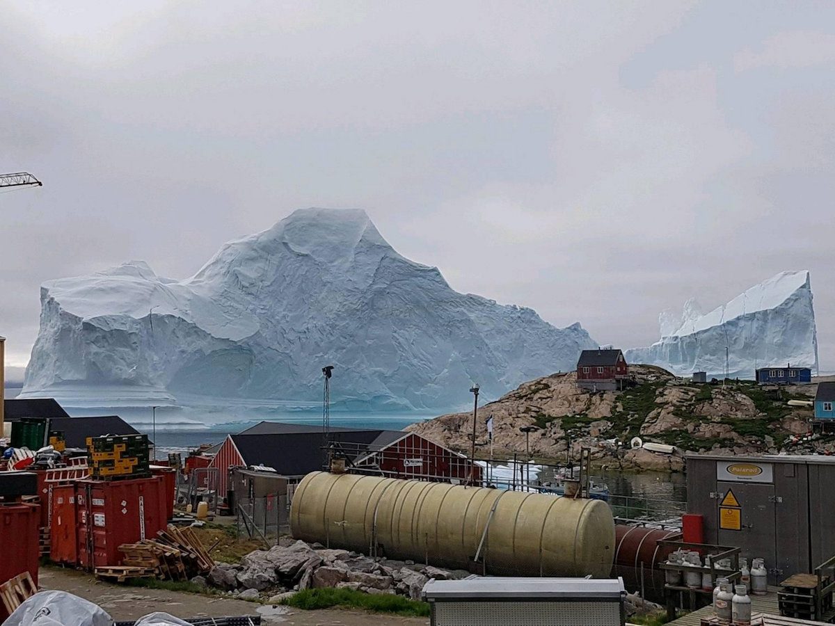 Massive Iceberg Threatens Greenland Village