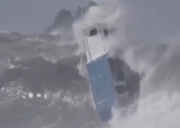 Watch This Boat Get Tossed by a Huge Wave
