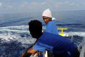Migrants are seen resting on board the MV Aquarius rescue ship
