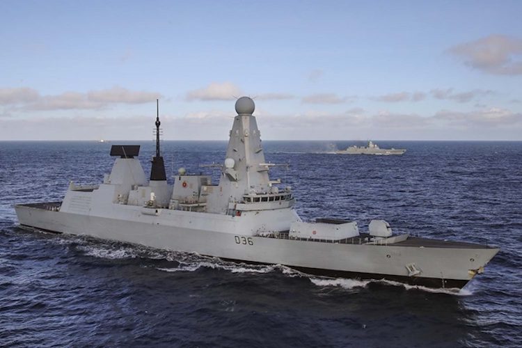 HMS Defender escorts russian envoy
