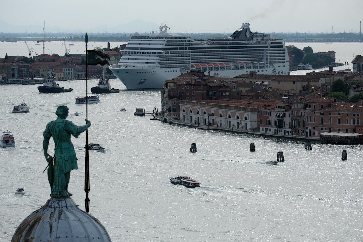 MSC Magnifica cruise ship passes in the Giudecca Canal in Venice