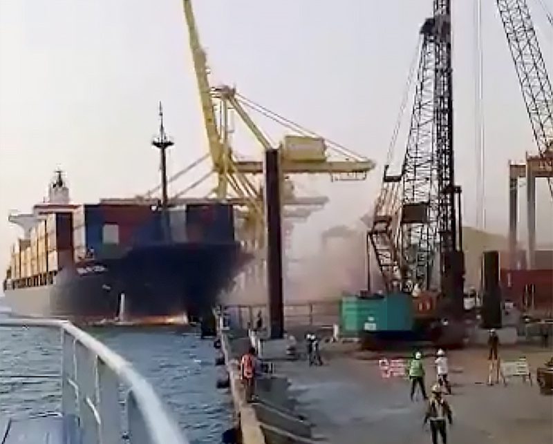A crane collapses after the Soul of Luck ship slams into a pier in Tanjung Emas, Semarang