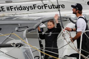 Swedish 16-year-old activist Greta Thunberg sails underneath the Verrazano-Narrows Bridge on the Malizia II racing yacht in New York Harbor