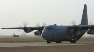 A C-130 Hercules from Pope Air Force Base, N.C., taxies down a runway at Joint Base Balad, Iraq