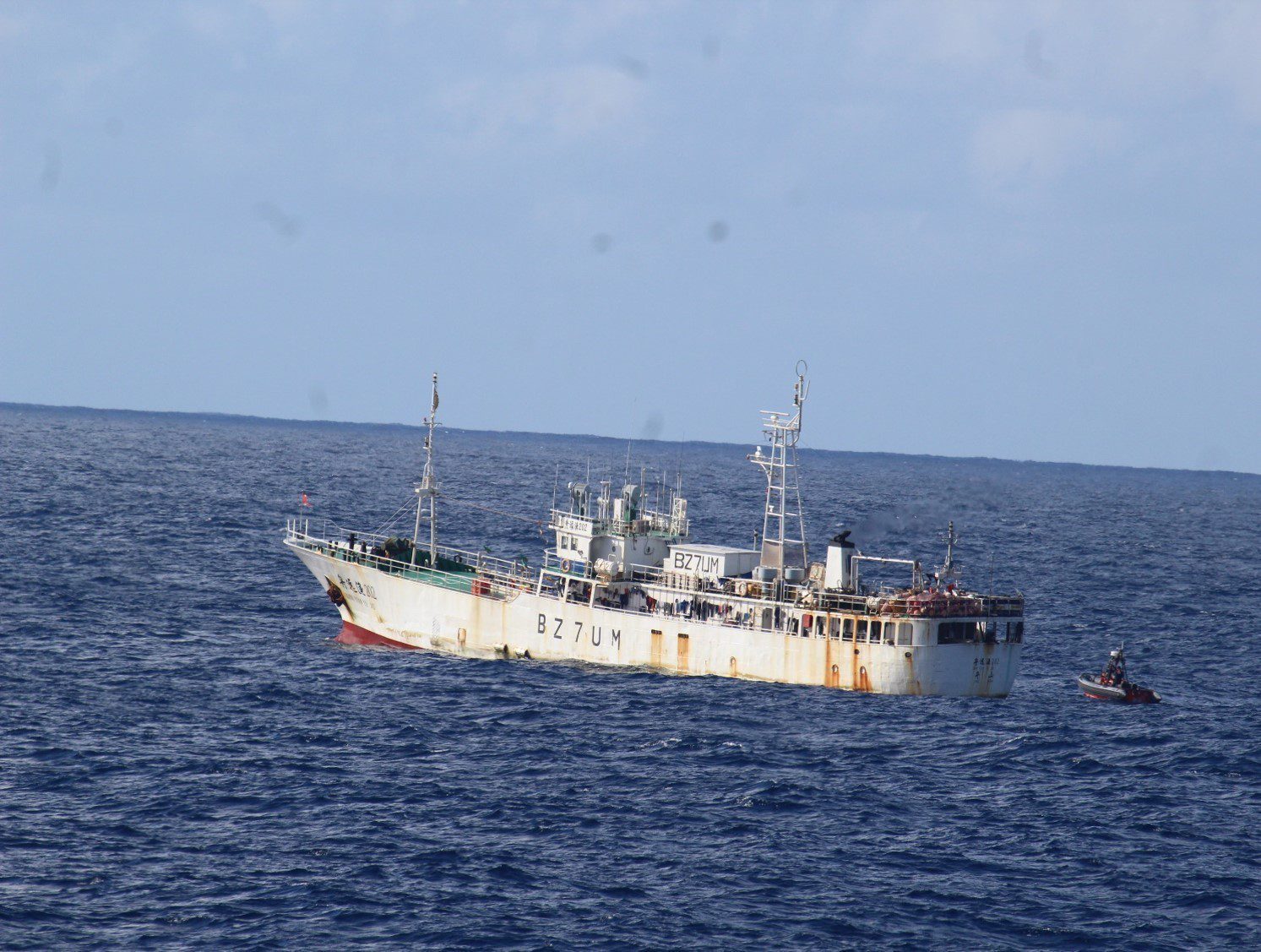 A boarding team from the Coast Guard Cutter Mellon (WHEC 717) approach a fishing vessel on the high seas in January 2019 while patrolling in support of counter-Illegal, Unregulated and Unreported fishing and global security missions. U.S. Coast Guard Photo