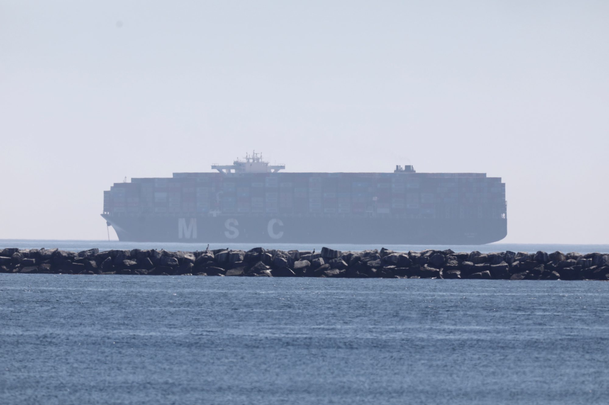 The container ship MSC Danit is seen the day after U.S. Coast Guard and National Transportation Safety Board (NTSB) marine casualty investigators boarded the container ship, off the Port of Long Beach, California, U.S. October 17, 2021. REUTERS/David Swanson