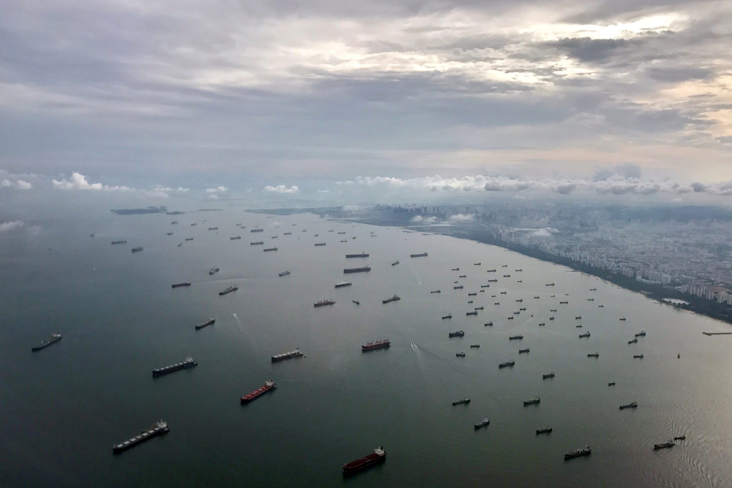 A bird's-eye view of ships along the coast in Singapore July 9, 2017. REUTERS/Jorge Silva/File Photo