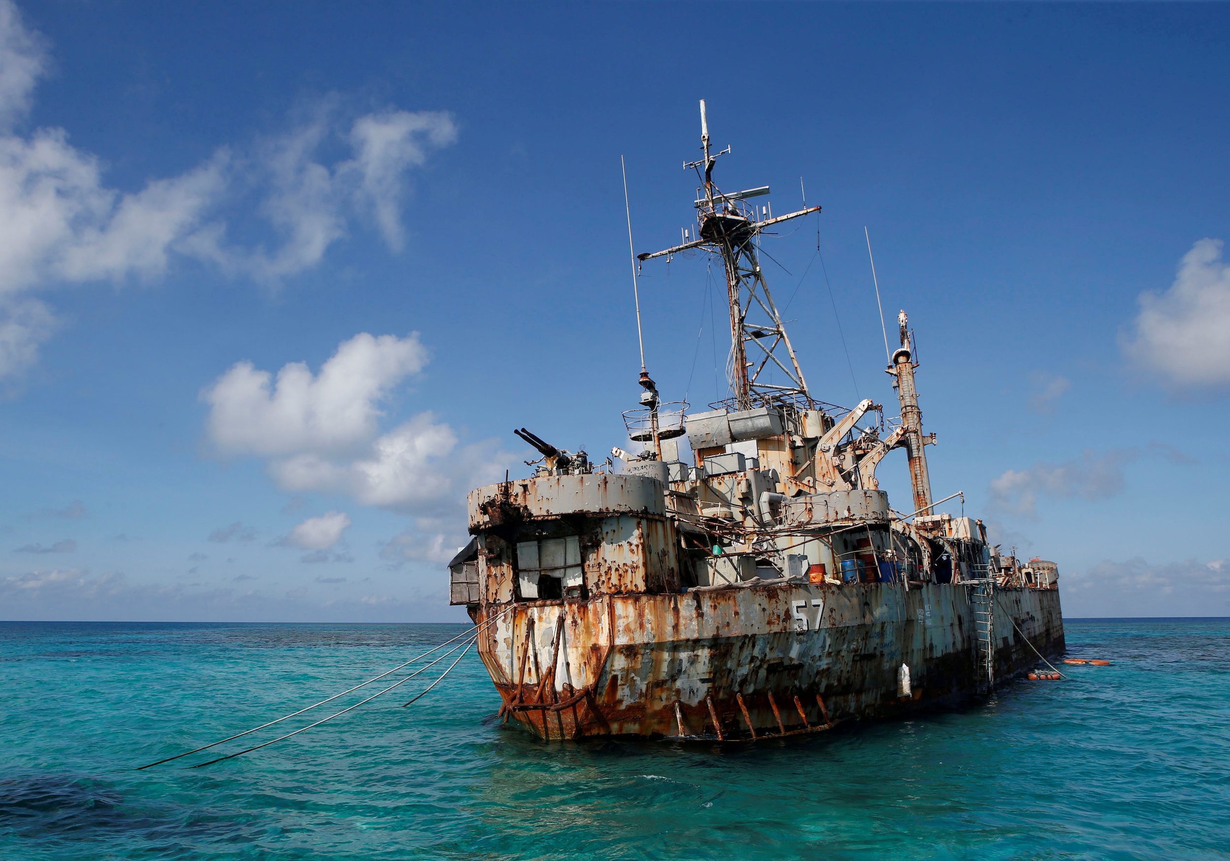 The BRP Sierra Madre, a marooned transport ship which Philippine Marines live on as a military outpost, is pictured in the disputed Second Thomas Shoal, part of the Spratly Islands in the South China Sea March 30, 2014. REUTERS/Erik De Castro