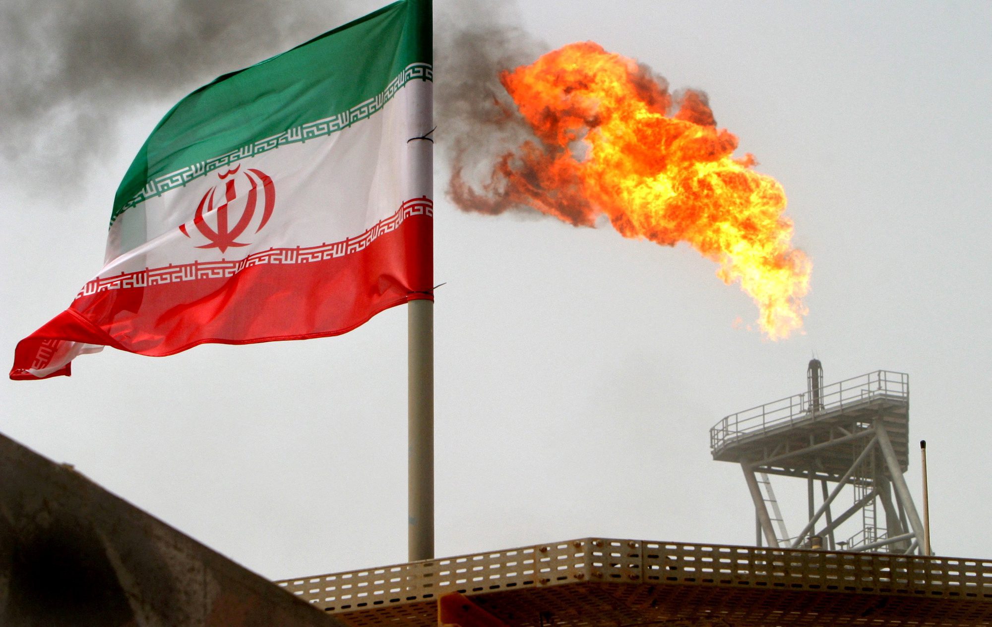 Iranian flag near oil refinery