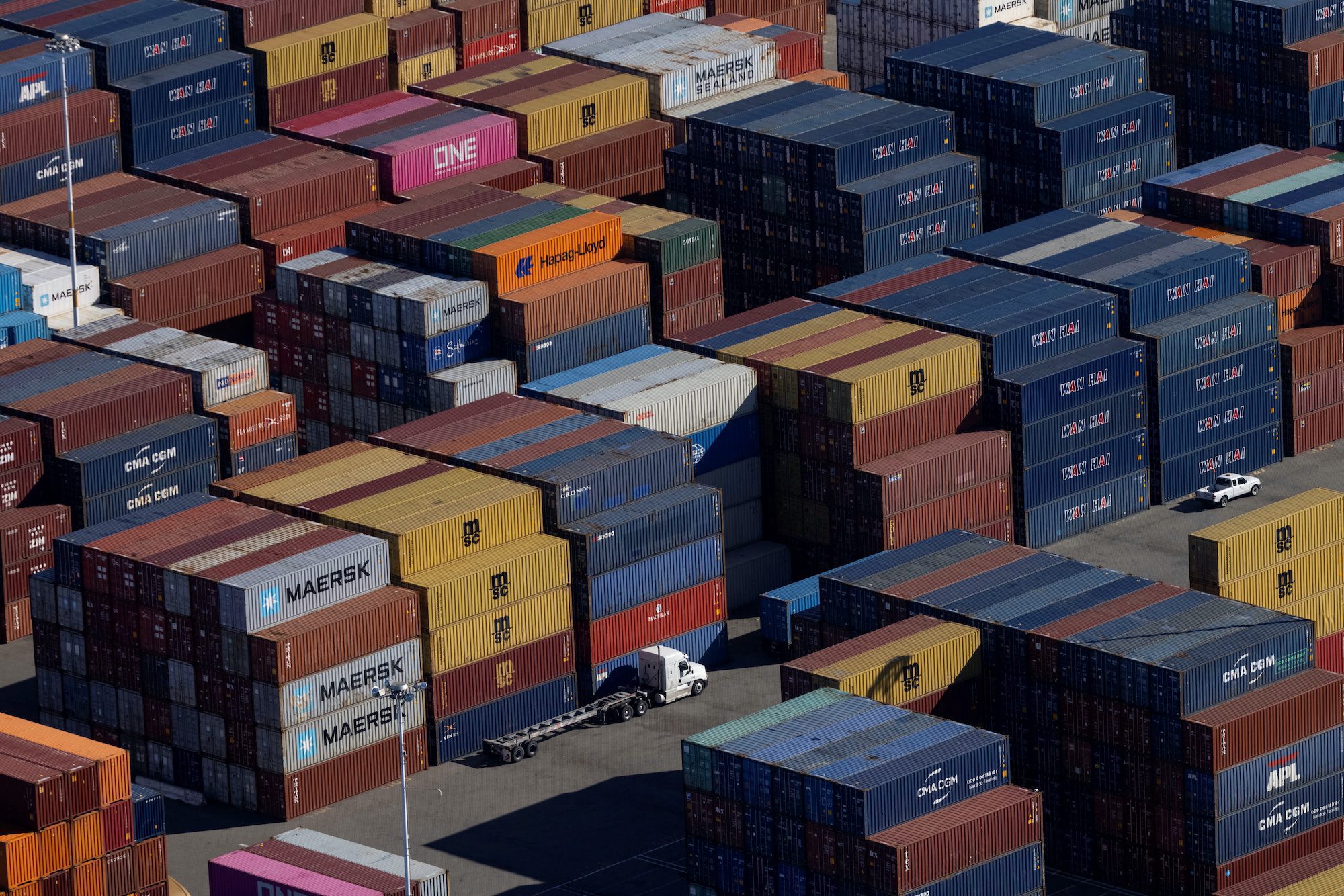 FILE PHOTO: Shipping containers are seen at the container terminal of the port of Oakland, California, U.S., October 28, 2021. REUTERS/Carlos Barria/File Photo