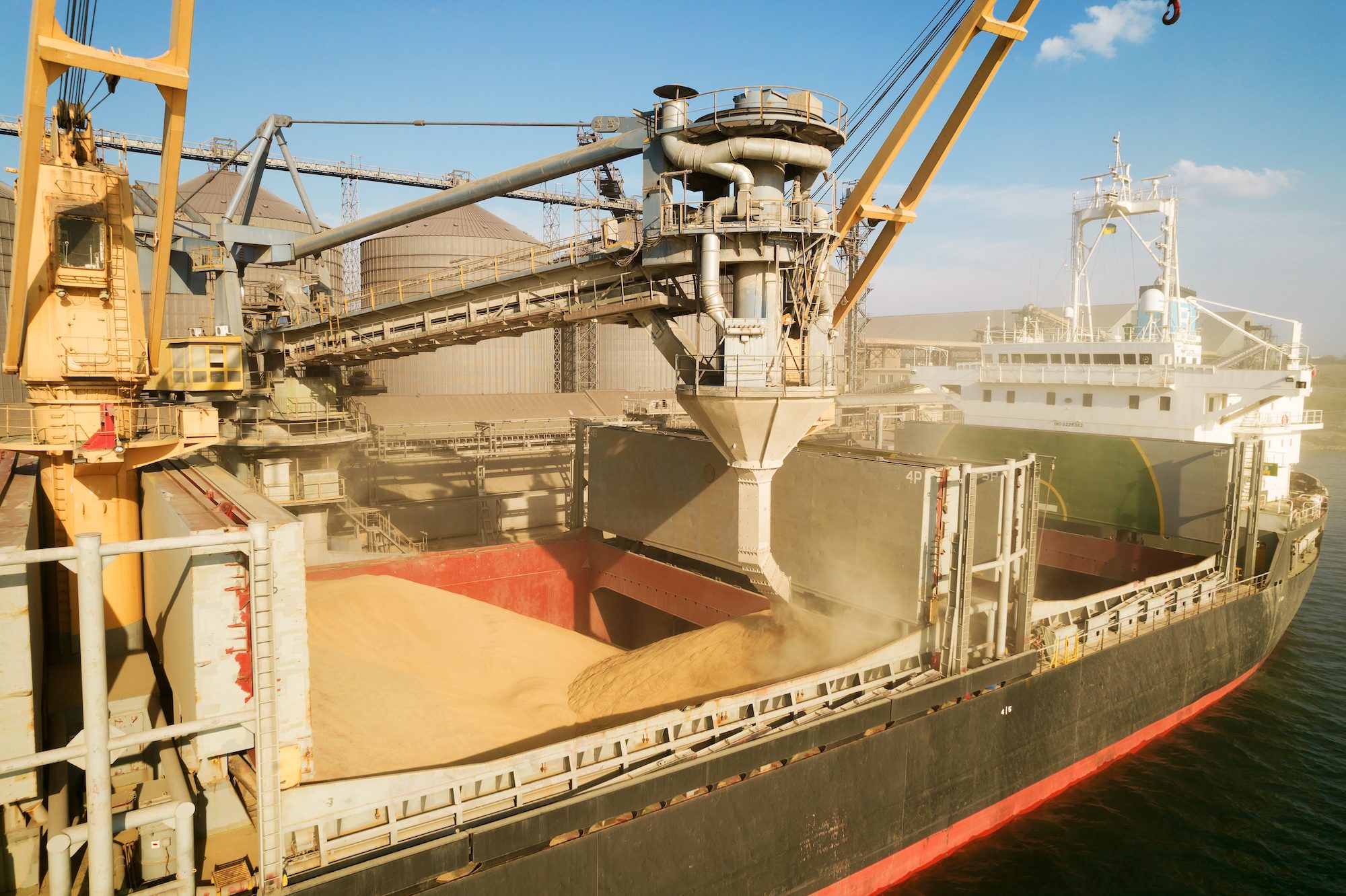 ship loads grain at the port of Odessa, Ukraine