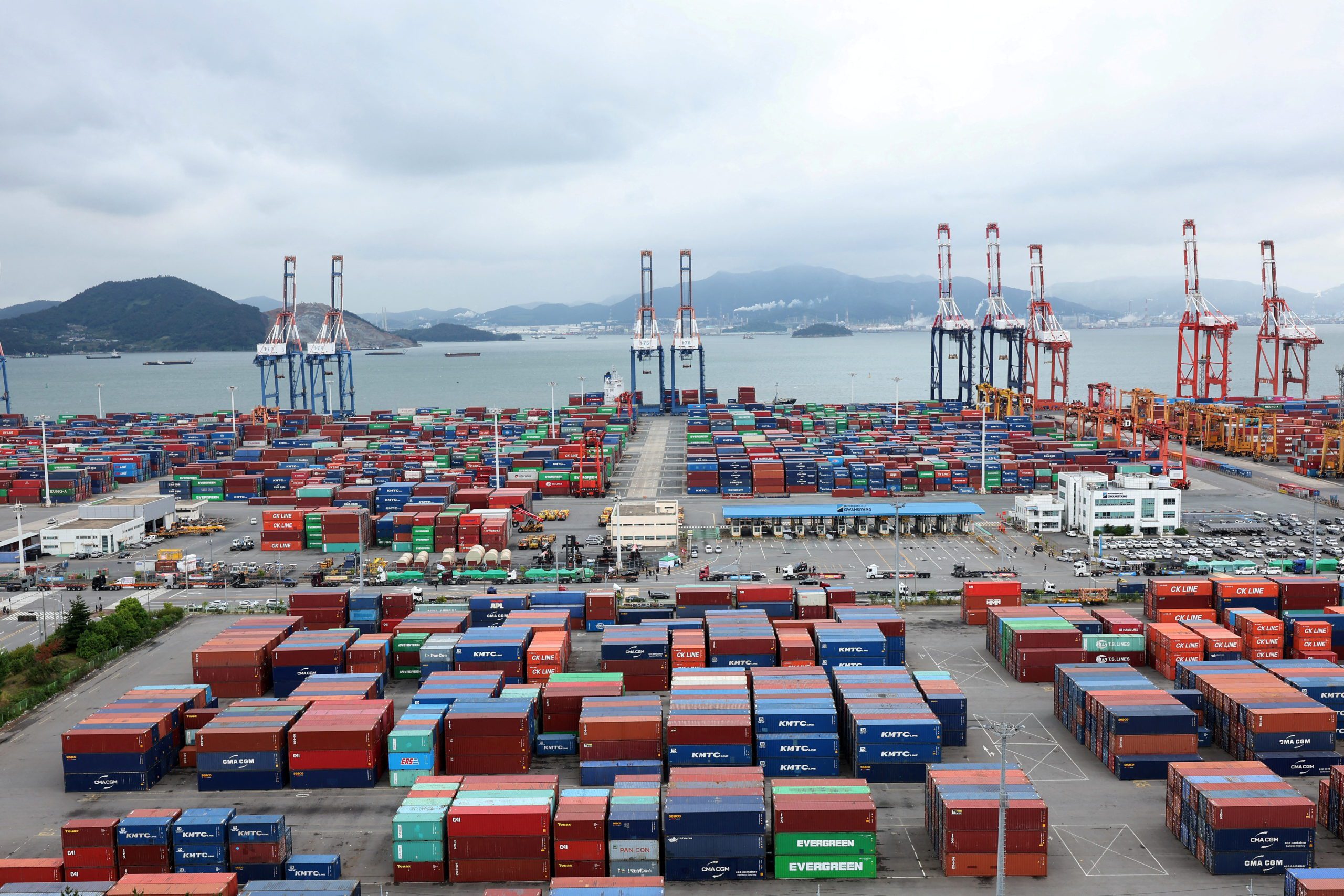FILE PHOTO: Shipping containers are stacked at Gwangyang port in Gwangyang, South Korea, June 14, 2022. Yonhap via REUTERS