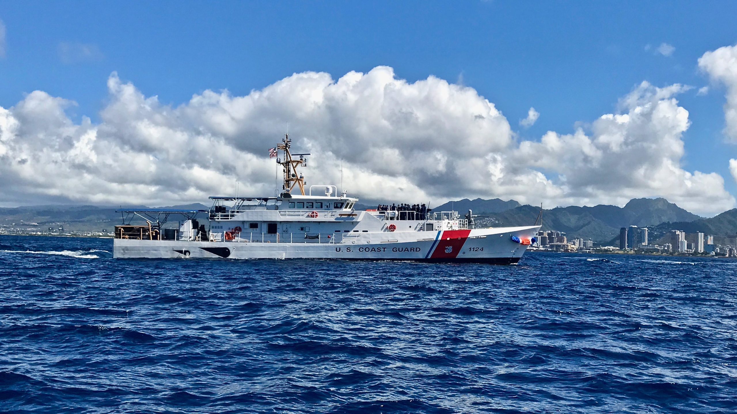 USCGC Oliver Berry sailing near clouds