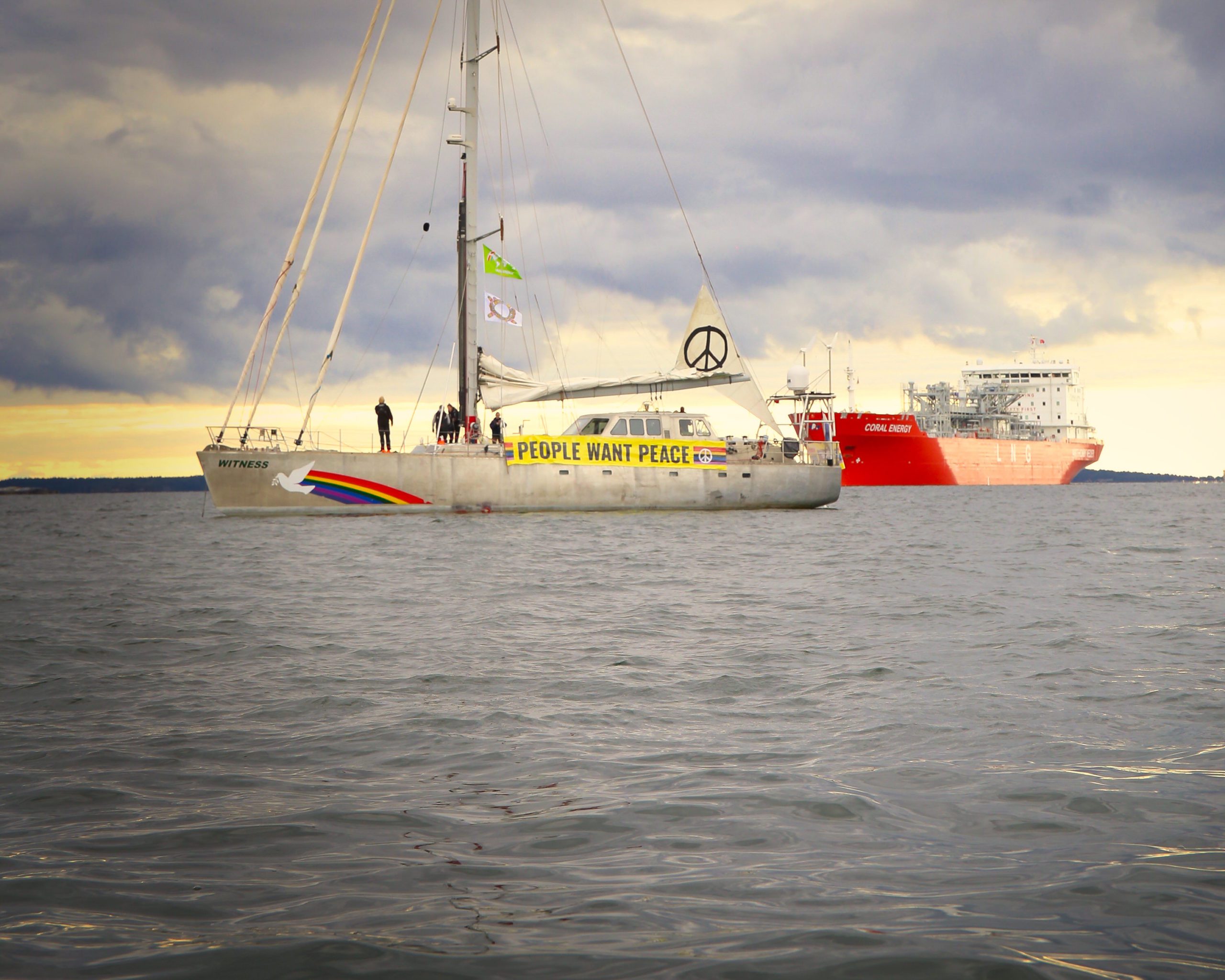 Greenpeace Sailboat blocking LNG tanker