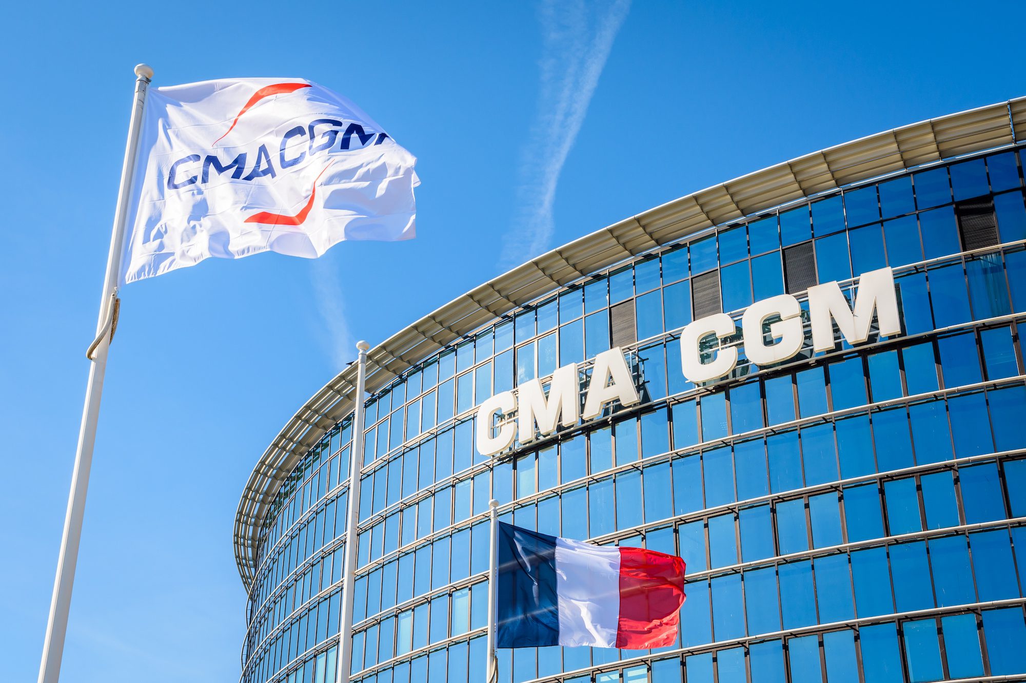 cma cgm headquaters and logo with French flag