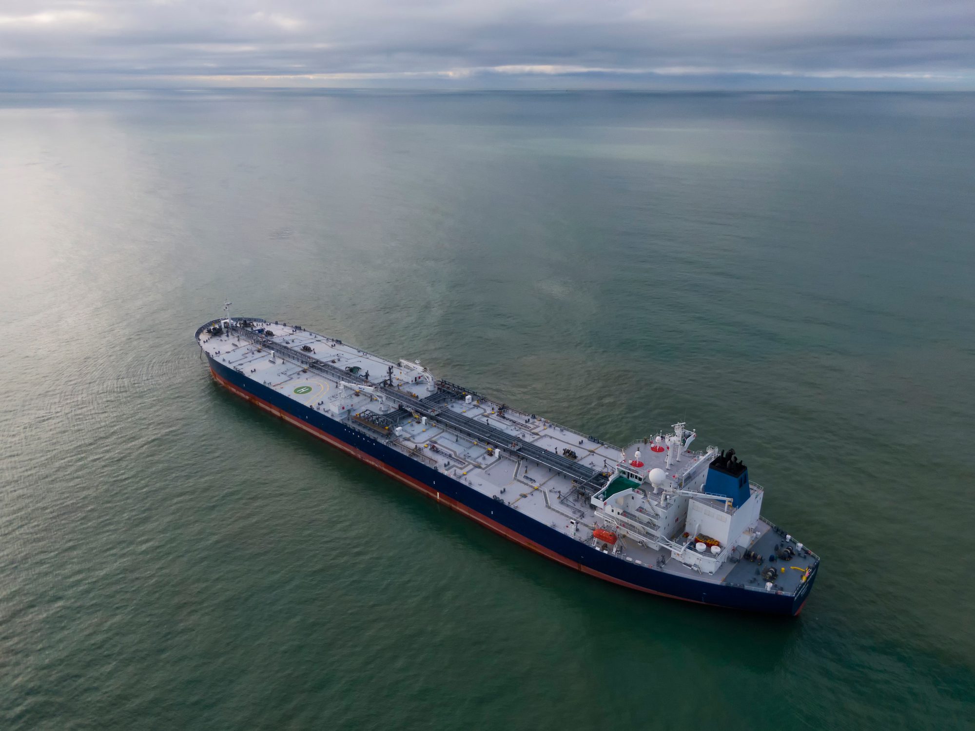 Aerial photo of an oil tanker at anchor. Stock Photo: Nickeo23/Shutterstock