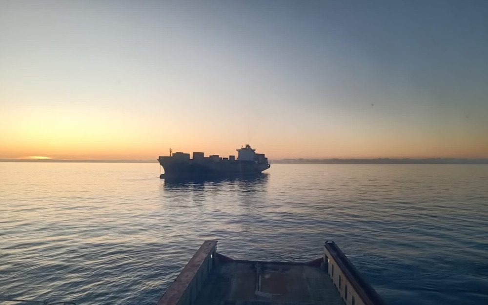 Broken Down Containership Safely Anchored in New Zealand, Awaiting Tow to Port