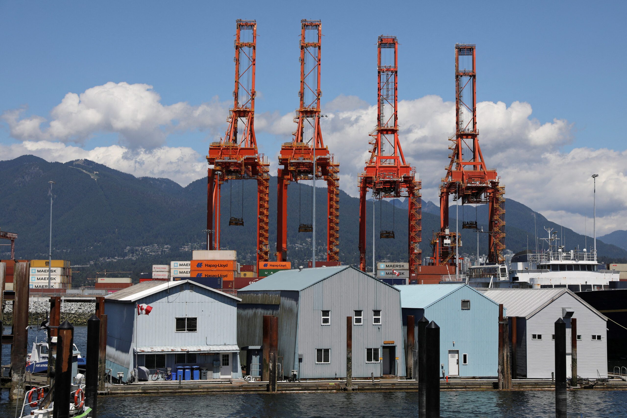 FILE PHOTO: Shipping cranes lie idle after longshoremen with the International Longshore and Warehouse Union Canada (ILWU) went on strike at Canada's busiest port in Vancouver, British Columbia, Canada July 1, 2023. REUTERS/Chris Helgren/File Photo