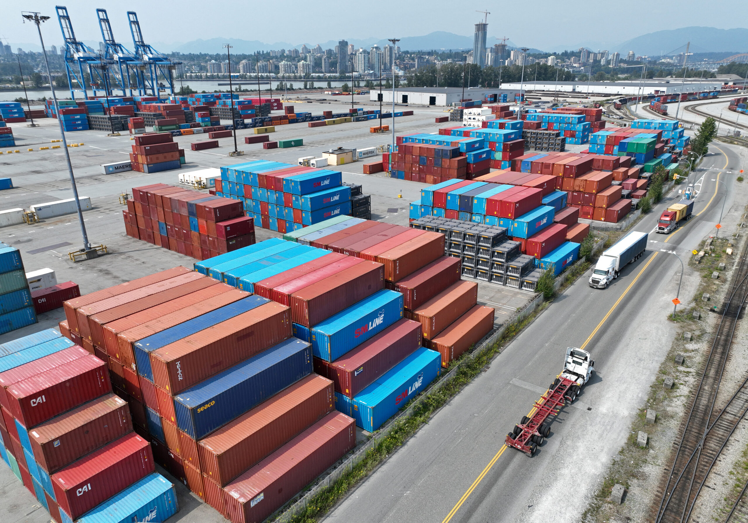 Shipping containers are stacked at New Westminster Port in Surrey