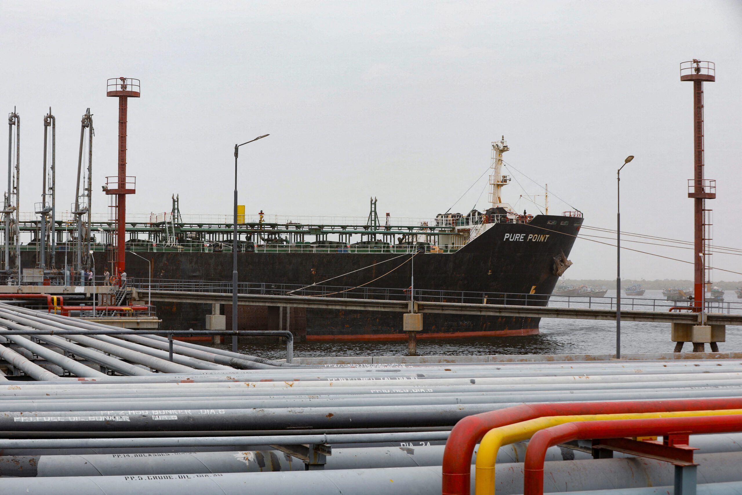 Crew members check the deck of the Russian oil cargo Pure Point, carrying crude oil, anchored at a port in Karachi, Pakistan June 13, 2023. REUTERS/Akhtar Soomro/File Photo
