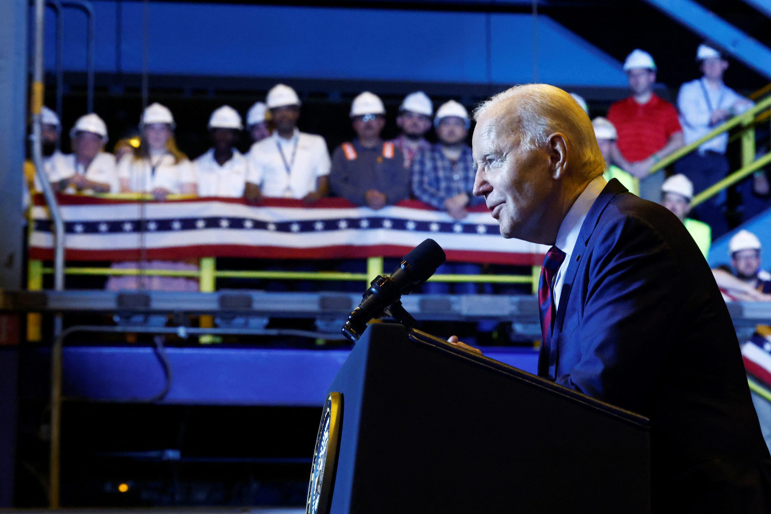 Joe Biden talking to shipyard workers