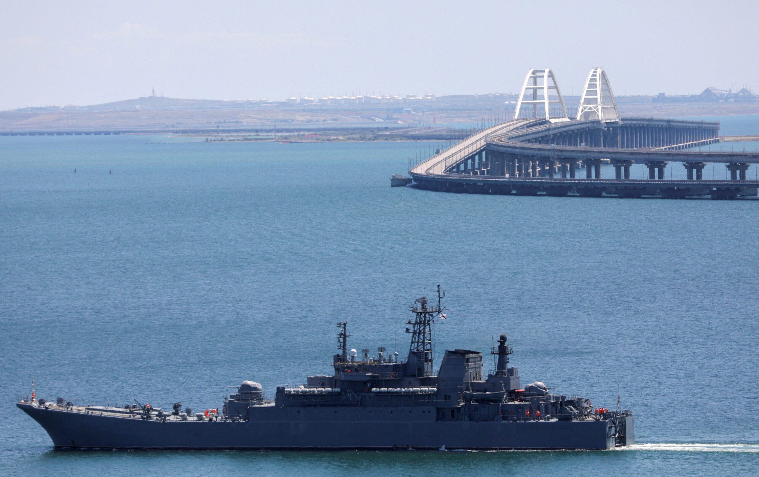 Crimea Kerch Strait bridge guarded by Russian navy warship
