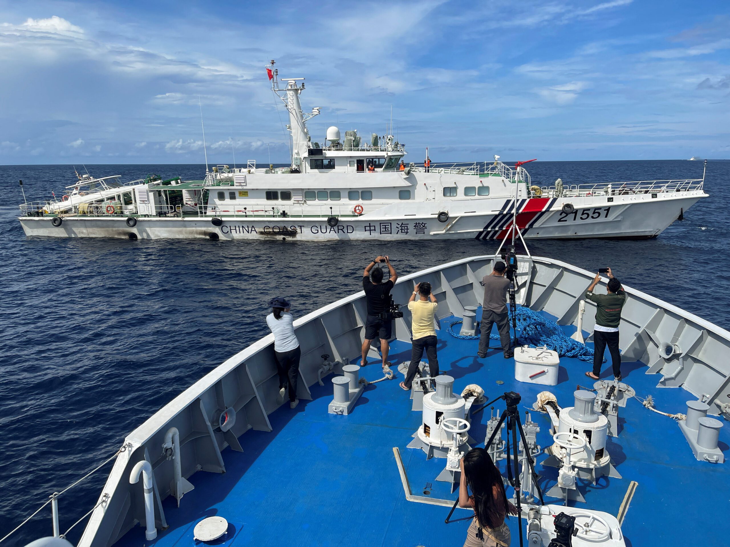 Chinese and Philippines Coast Guard boats face off