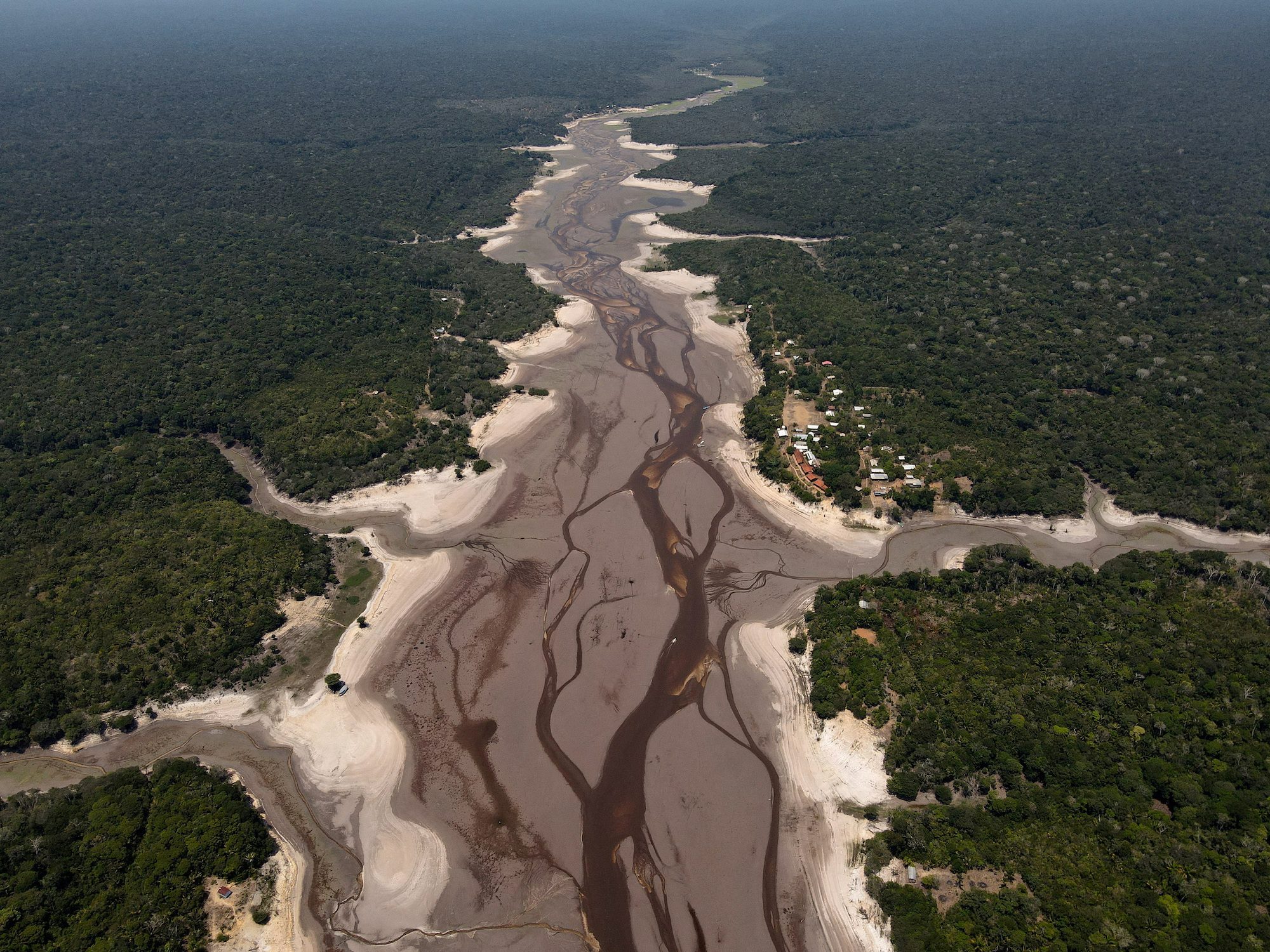 An aerial view shows the Tumbira River, which has been affected by the drought of Negro River, at a Rio Negro Sustainable Development Reserve, in Iranduba, Amazonas state, Brazil, October 7, 2023. REUTERS/Bruno Kelly/File Photo